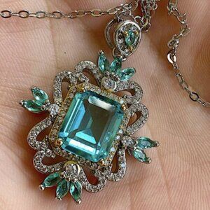 STERLING SILVER BLUE TOPAZ DIAMOND INLAY PENDENT